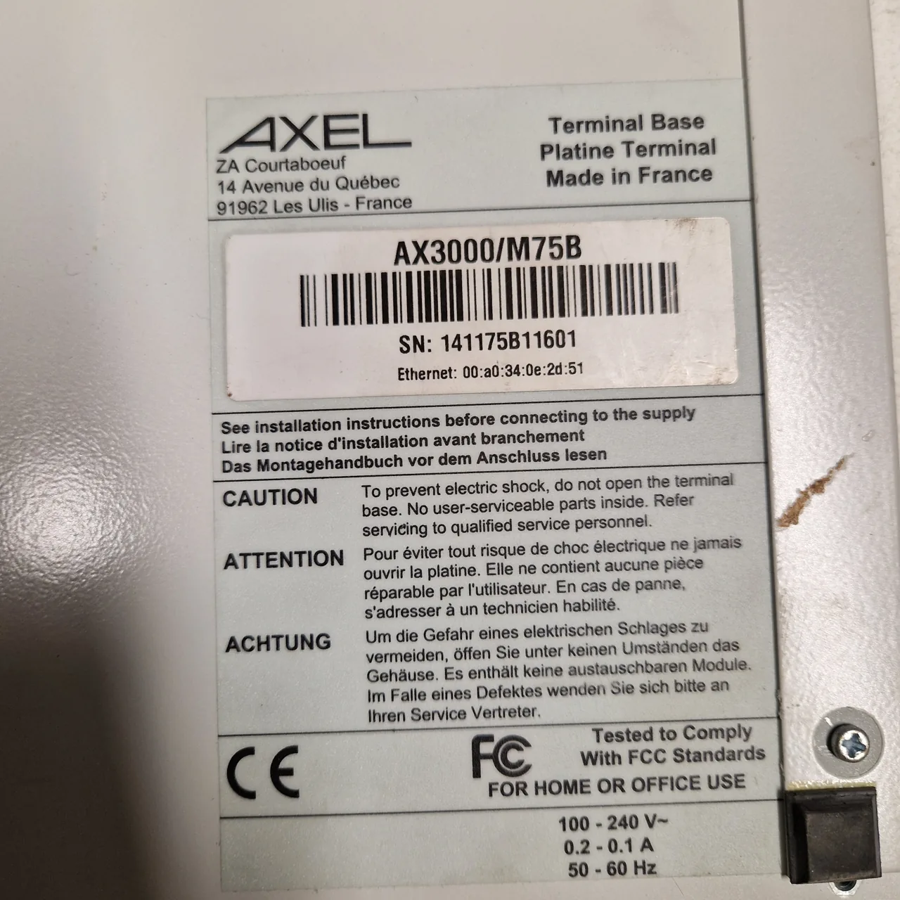 Plaque signalétique sous la Platine : AXEL ZA Courtaboeuf Les Ulis, Platine Terminal Made in France, AX3000/M75B, numéro de série et adresse Ethernet