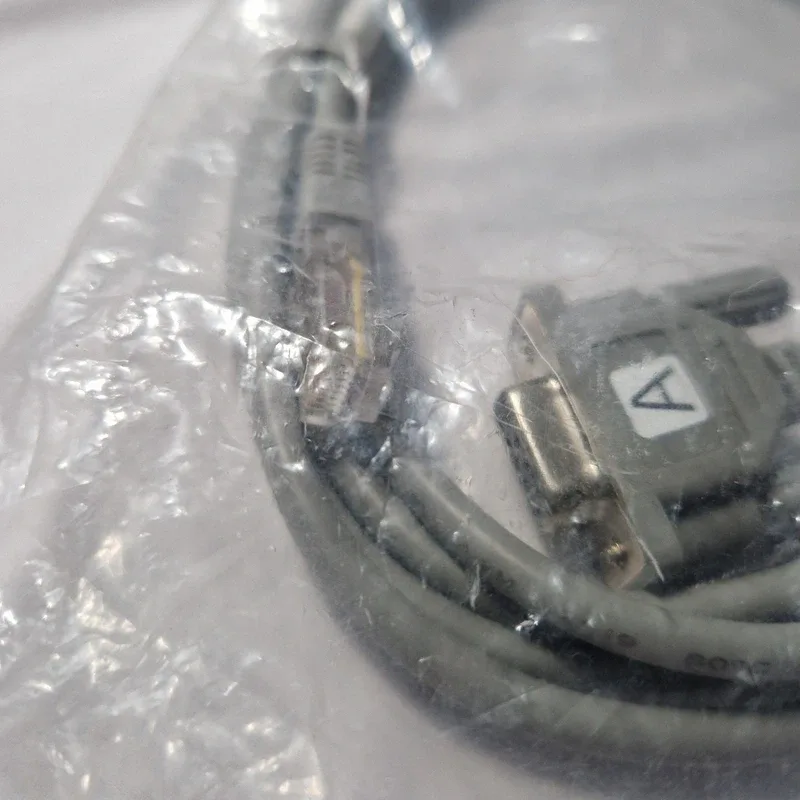 Câble console série RJ45 vers DB9 femelle (RS-232), gris, avec ferrite, sous sachet, photo 2