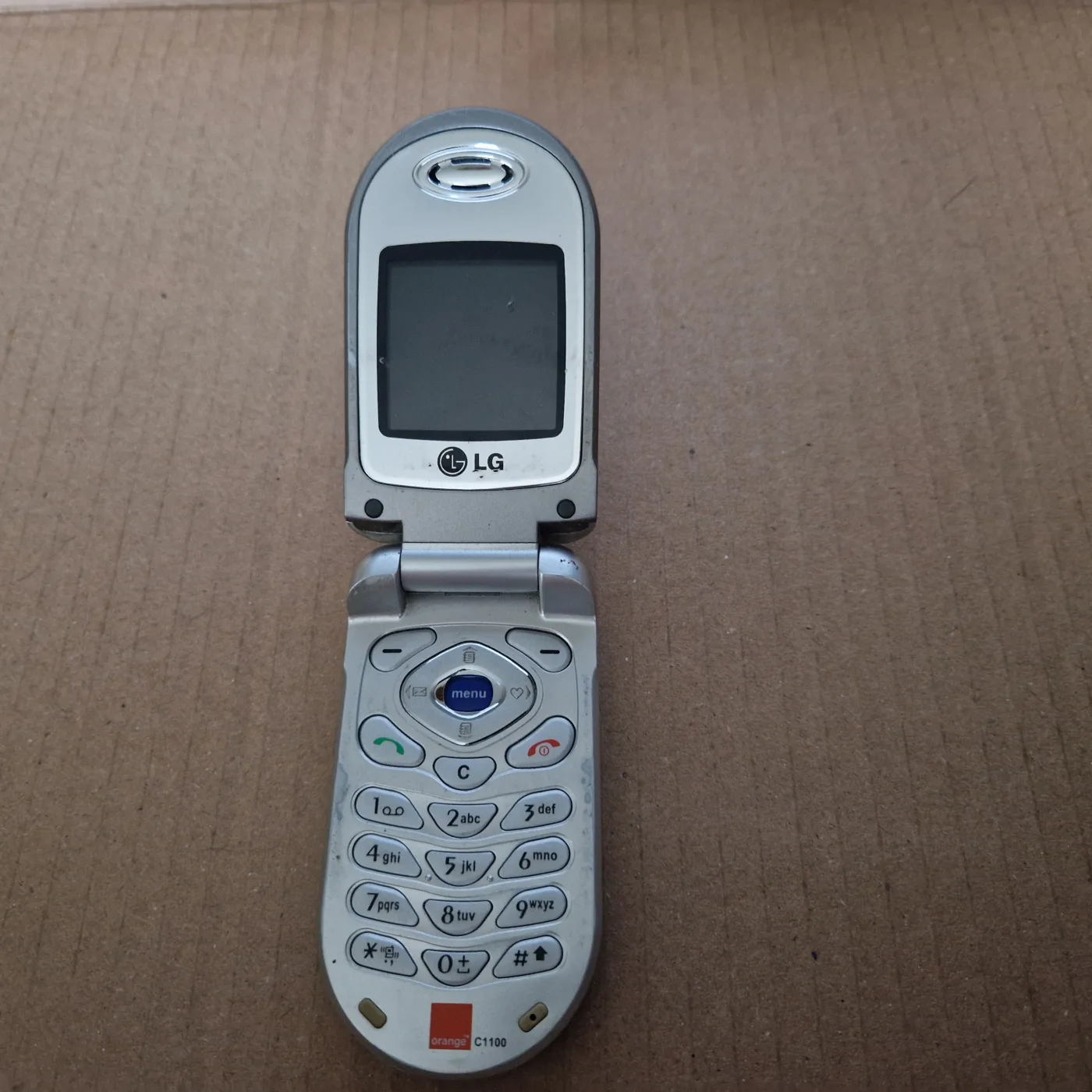 LG C1100, téléphone GSM à clapet 2004, capot miroir (coffret Orange), photo 1